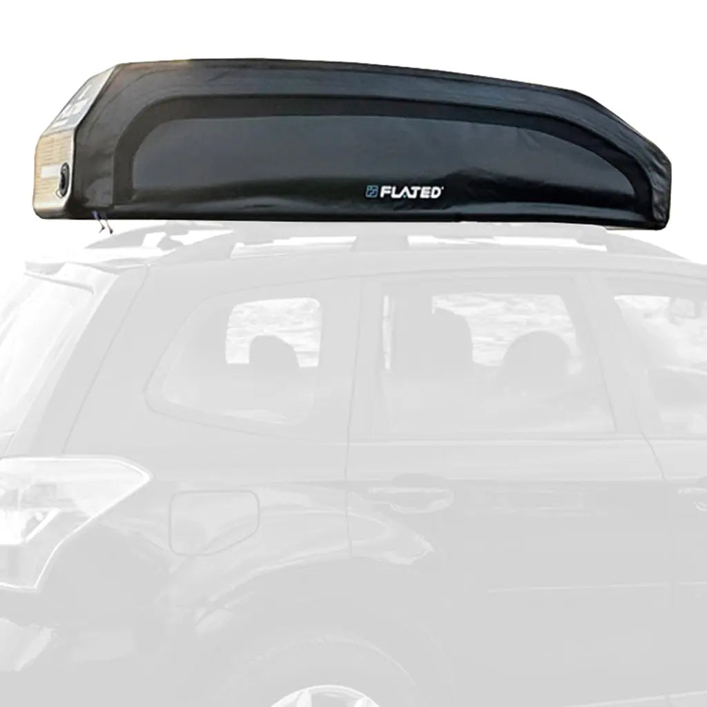 A FLATED SPORT CARRIER15 (OPEN BOX) rooftop cargo carrier in black is mounted on an SUV’s roof rack, shown from the side against a white background—perfect for storing gear on travel adventures.