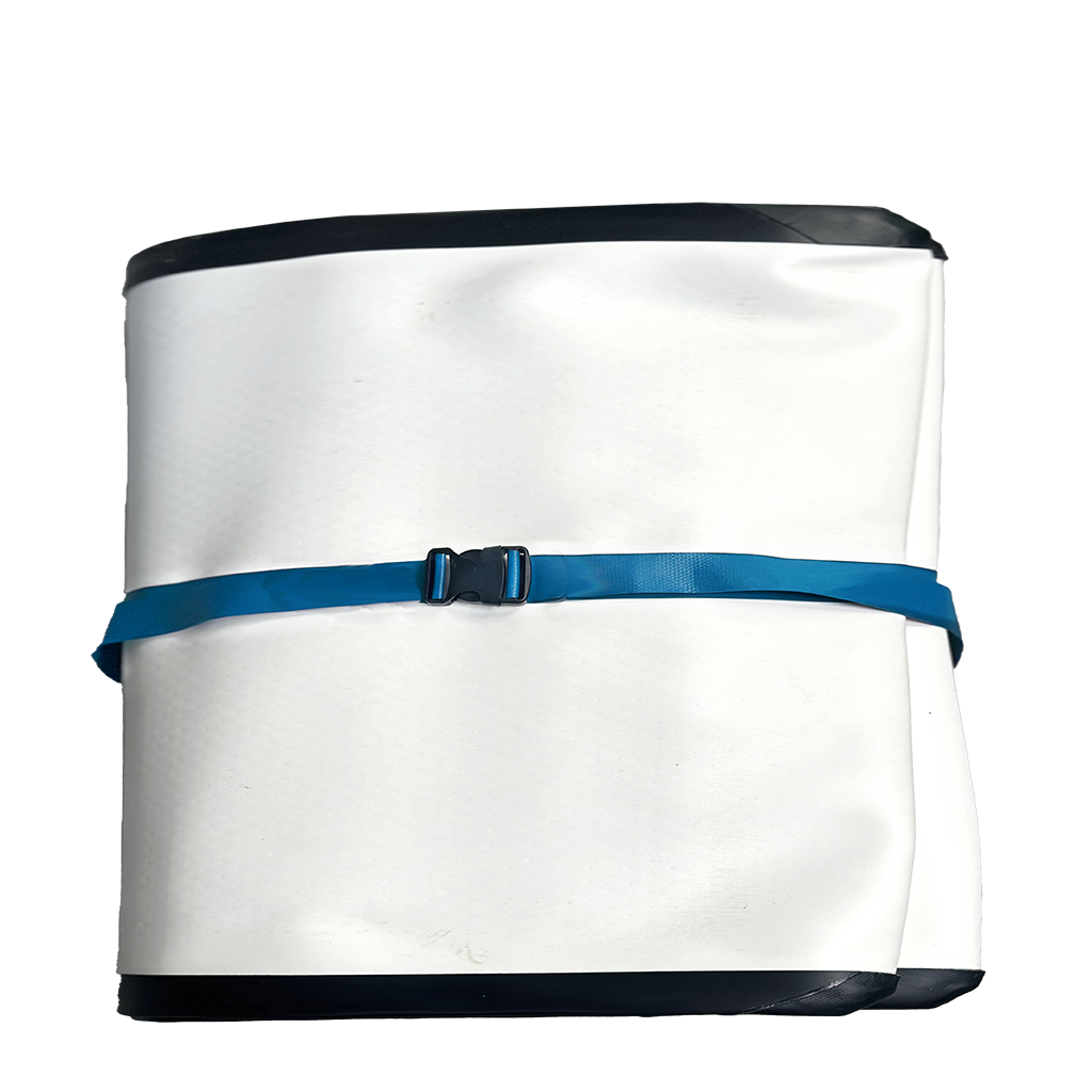 The FLATED FULL-SIZE COUCH, a rolled-up white tarpaulin perfect as portable camping furniture, is secured with a blue strap and black buckle, shown isolated on a white background.