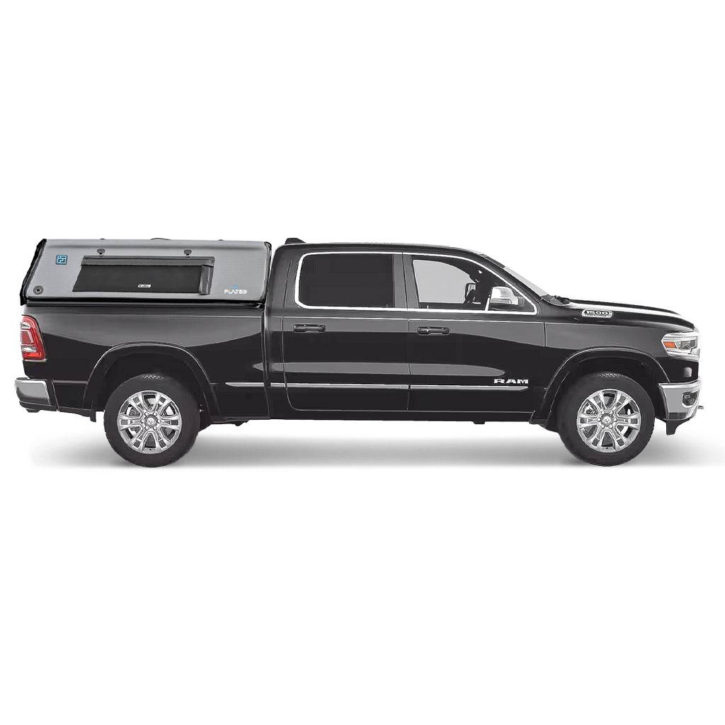 A black full-size pickup with four doors and chrome wheels is shown in profile on a white background, featuring the FLATED FULL-STANDARD DT CAP64—a silver lightweight truck shell.