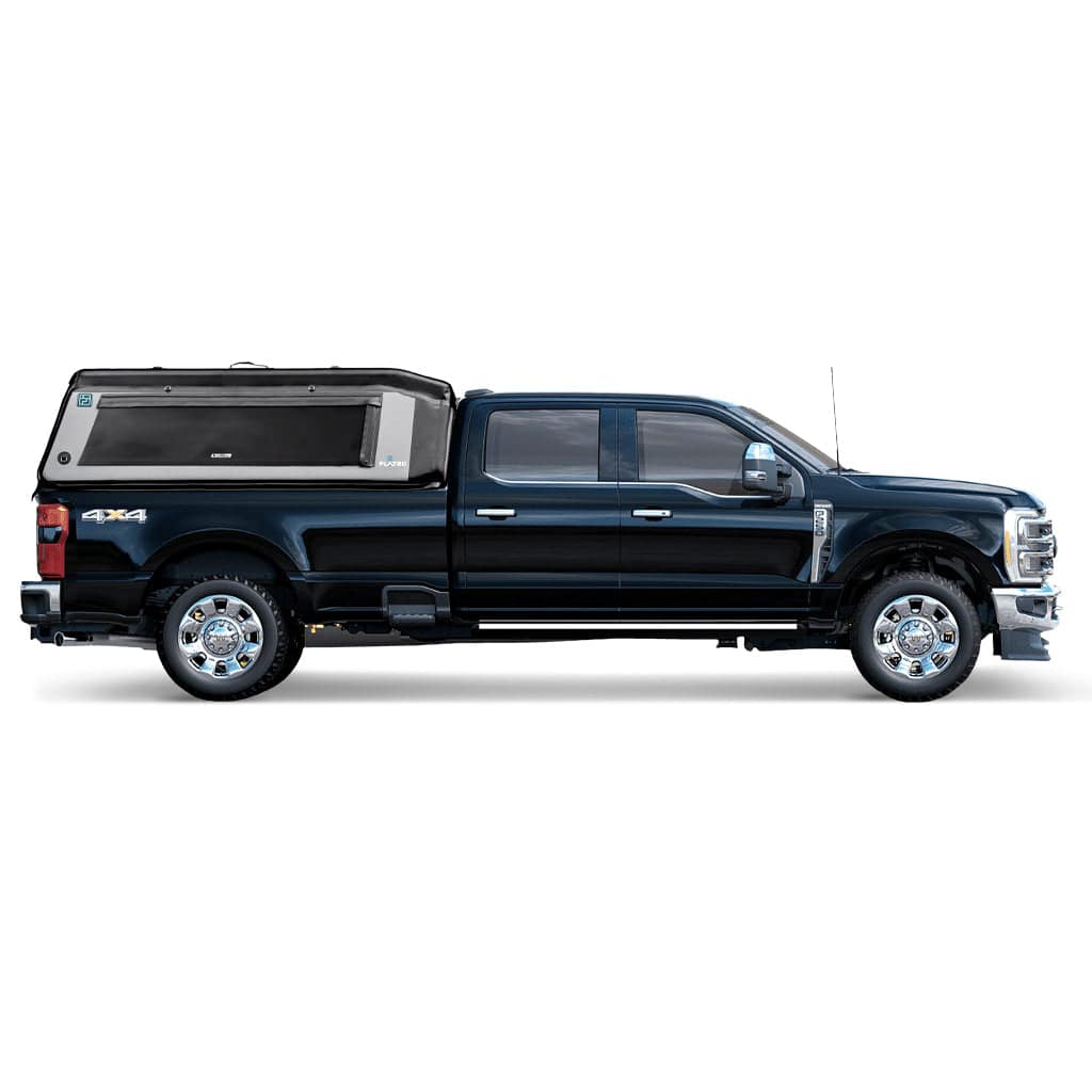 The FLATED FULL-LONG MR80, a black crew cab pickup with a raised, angled truck topper on its full-size bed, is shown in profile against a white background.