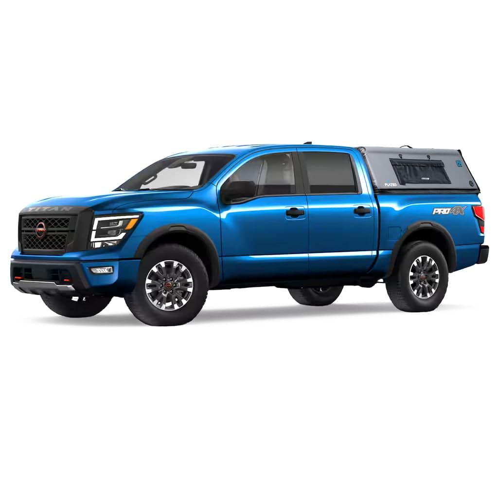 A white pickup with a gray FLATED FULL-SHORT CAP54 (OPEN BOX) inflatable topper, featuring black trim and window, snugly covers the truck’s full-size short bed. Also branded by Leer.