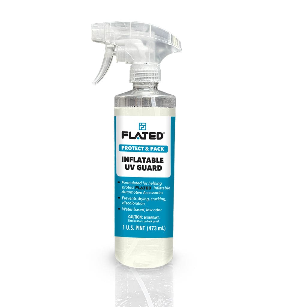 A clear spray bottle labeled FLATED MAIN UVGUARD with blue and white text, containing 1 US pint (473 mL) of water-based vinyl surface protector for inflatable gear UV protection.