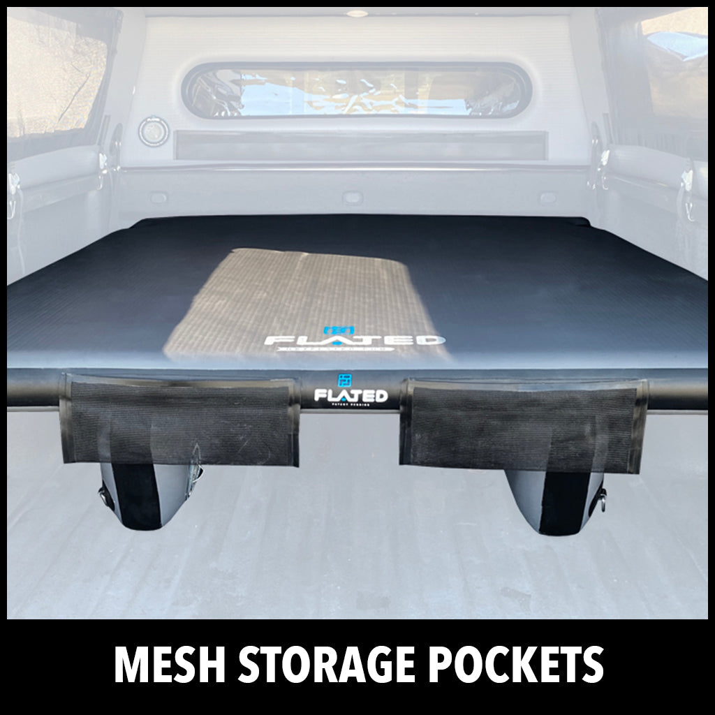 A truck bed with a black FLATED storage cover featuring mesh storage pockets attached beneath it. The text MESH STORAGE POCKETS is displayed at the bottom of the image.