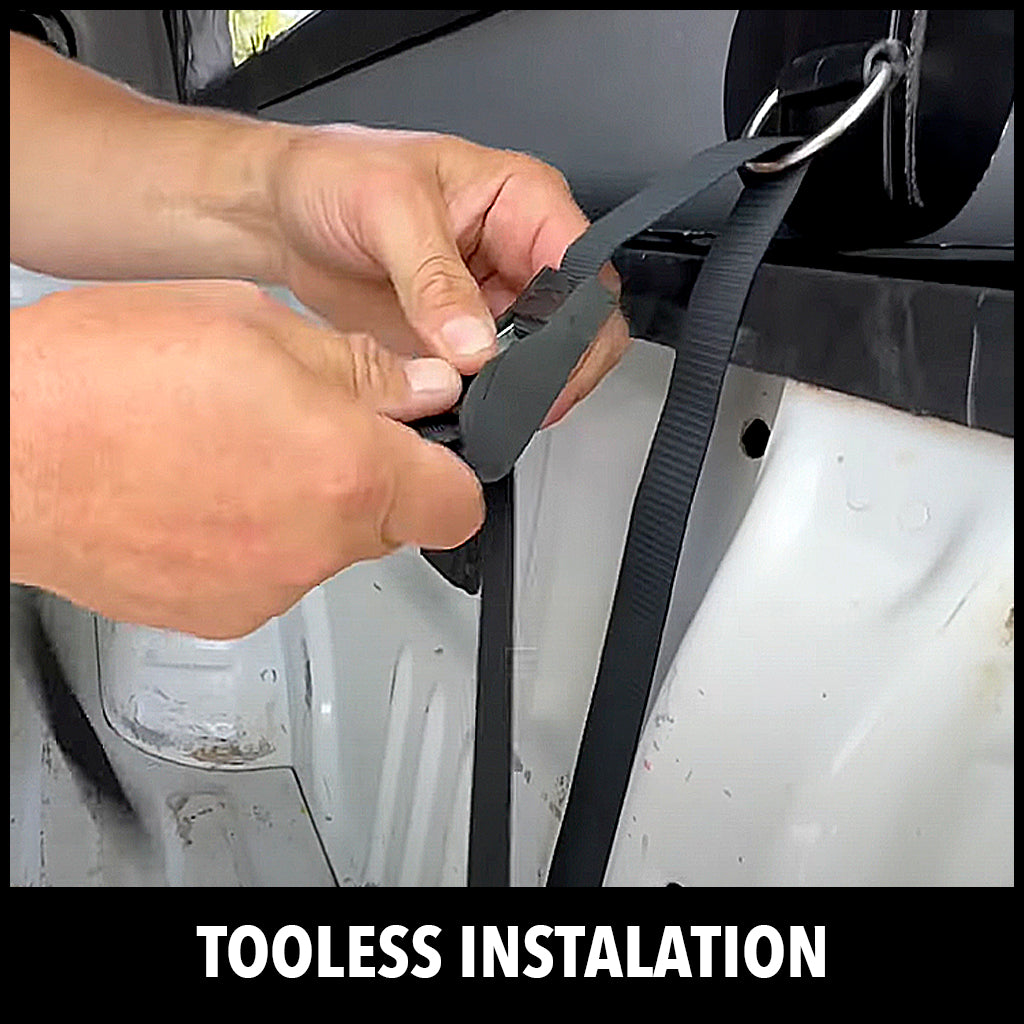 Close-up of hands attaching a strap to a metal ring in the bed of a truck, demonstrating a toolless installation method. Text at the bottom reads TOOLESS INSTALATION.
