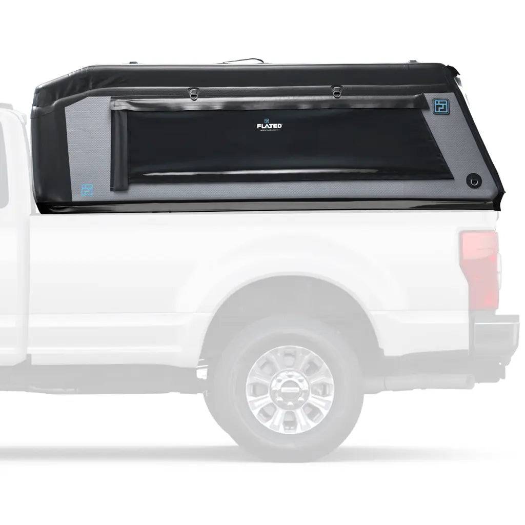 A white pickup truck with a black and gray FLATED FULL-LONG MR80 (OPEN BOX) Air-Topper inflatable shell securely fitted over the cargo area, viewed from the side.