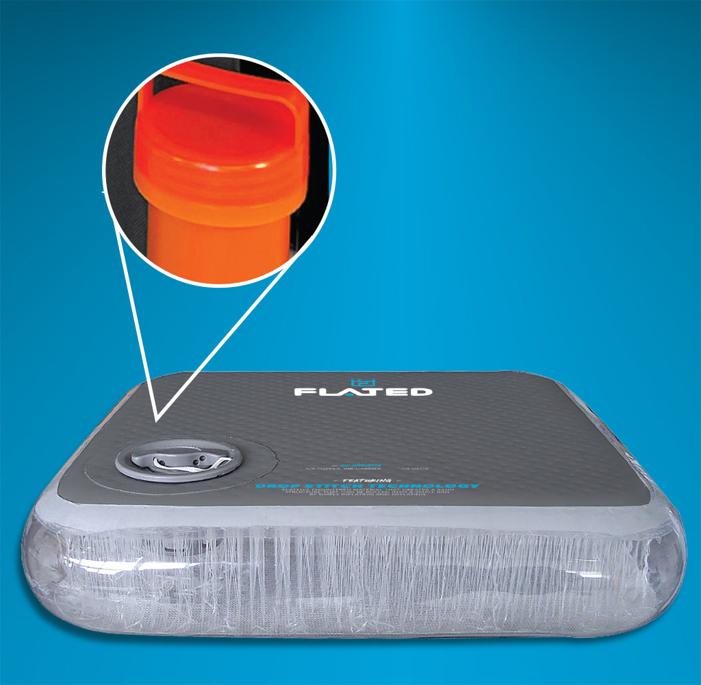 A rectangular inflatable mattress with a gray top and transparent sides, featuring a close-up inset of an orange valve or cap used for inflation, set against a blue background.